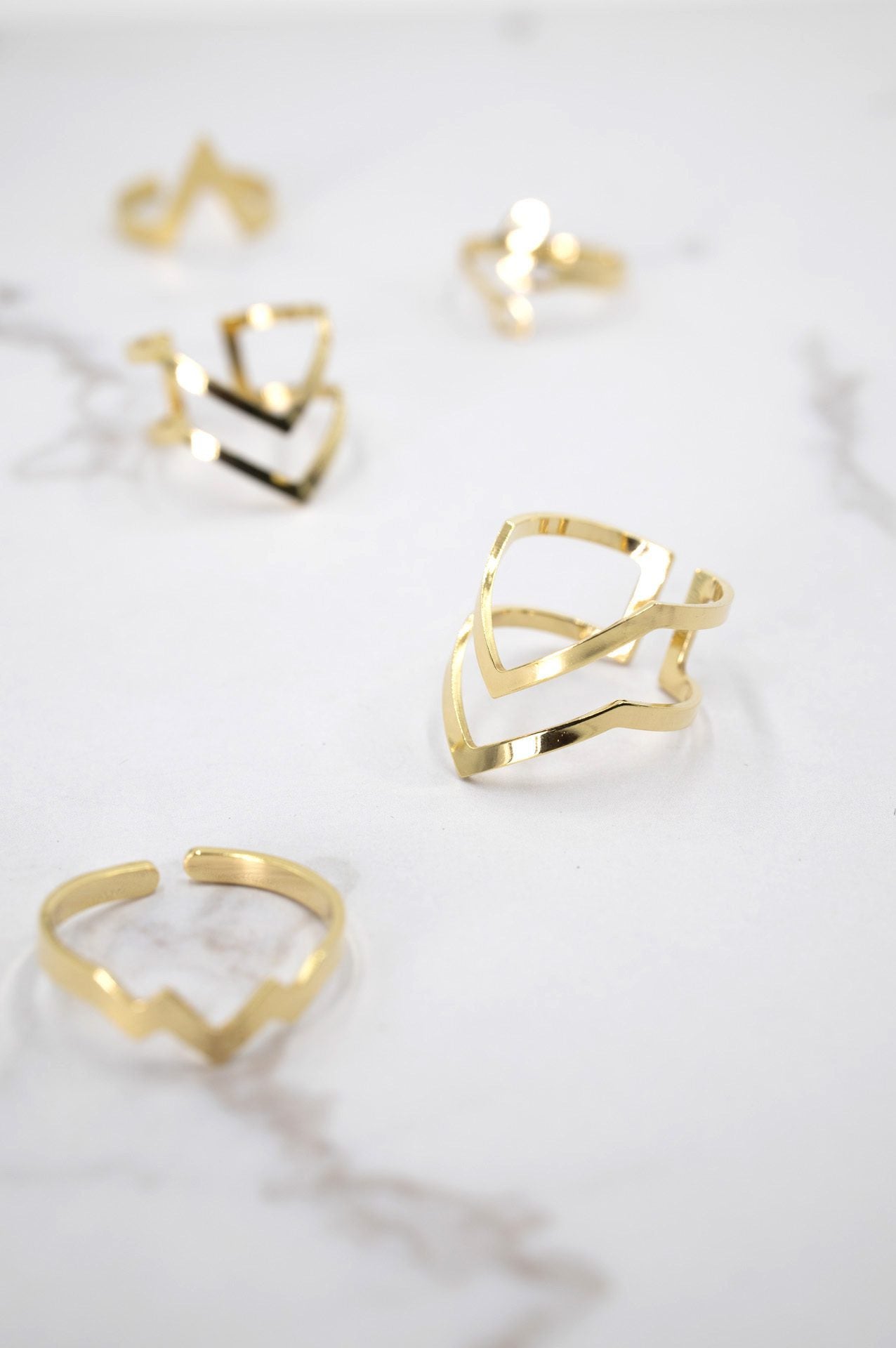 Anillo Dos flechas EPD chapado oro 24k