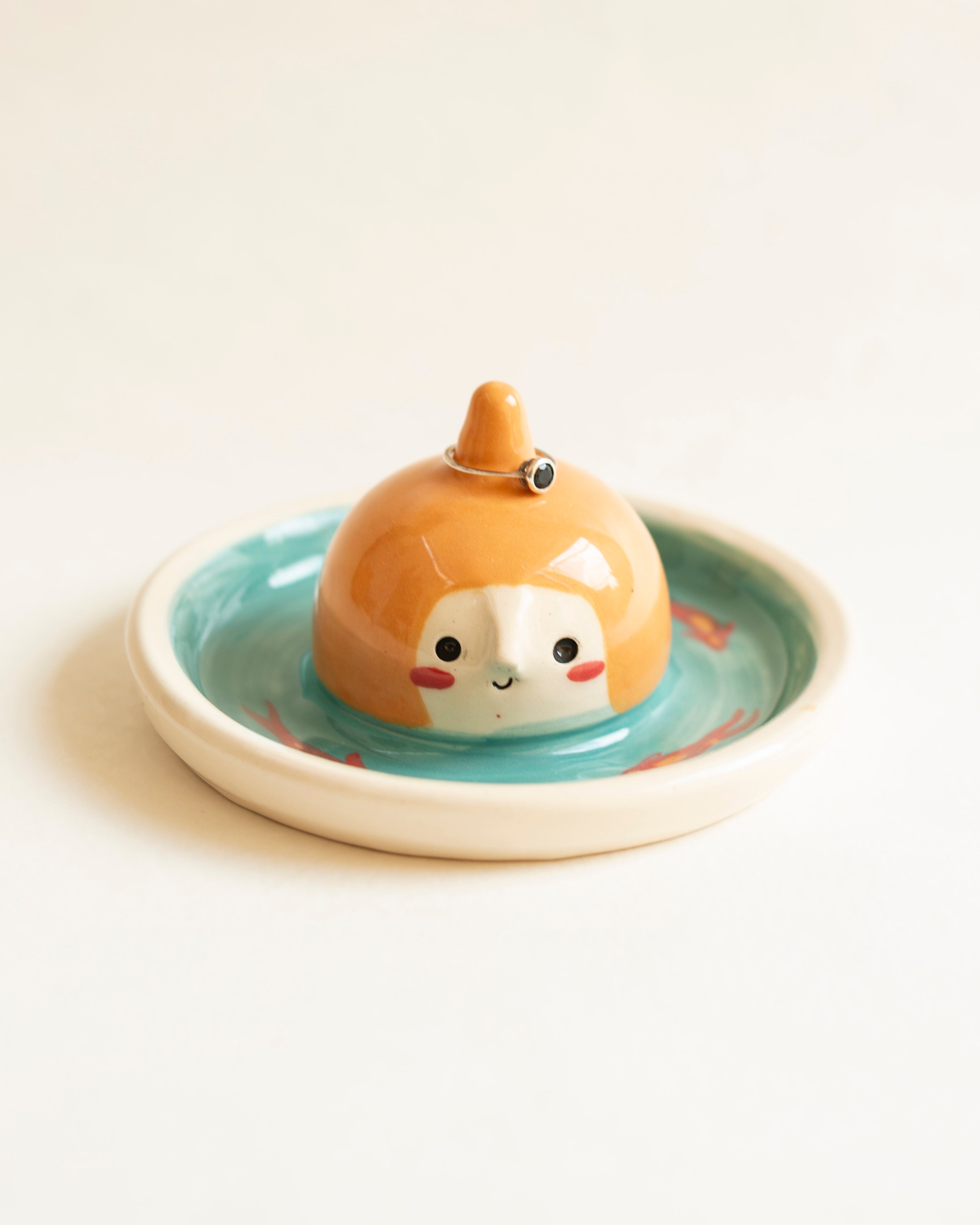 Ring holder, creature with scales