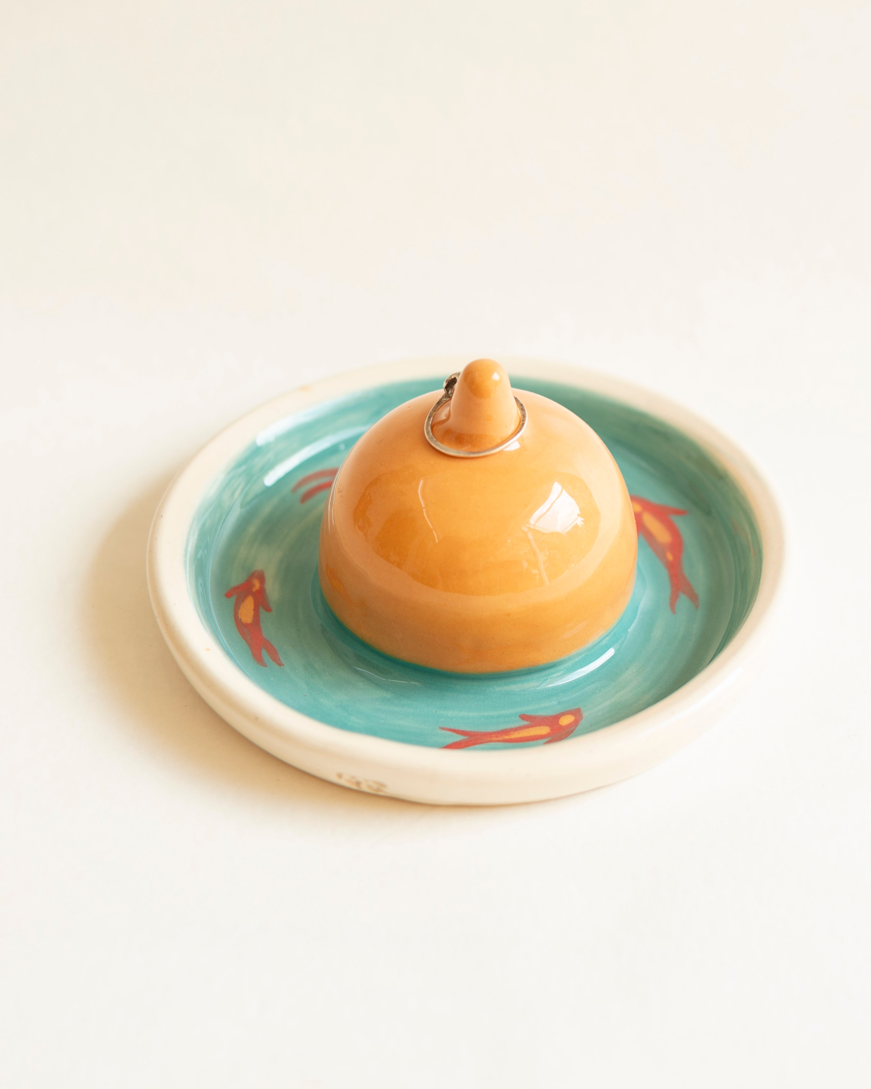 Ring holder, creature with scales