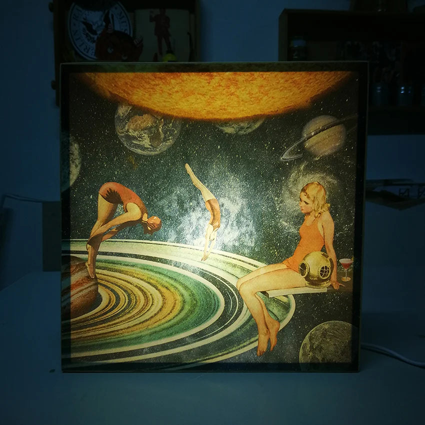 Caja de luz Bañistas en saturno