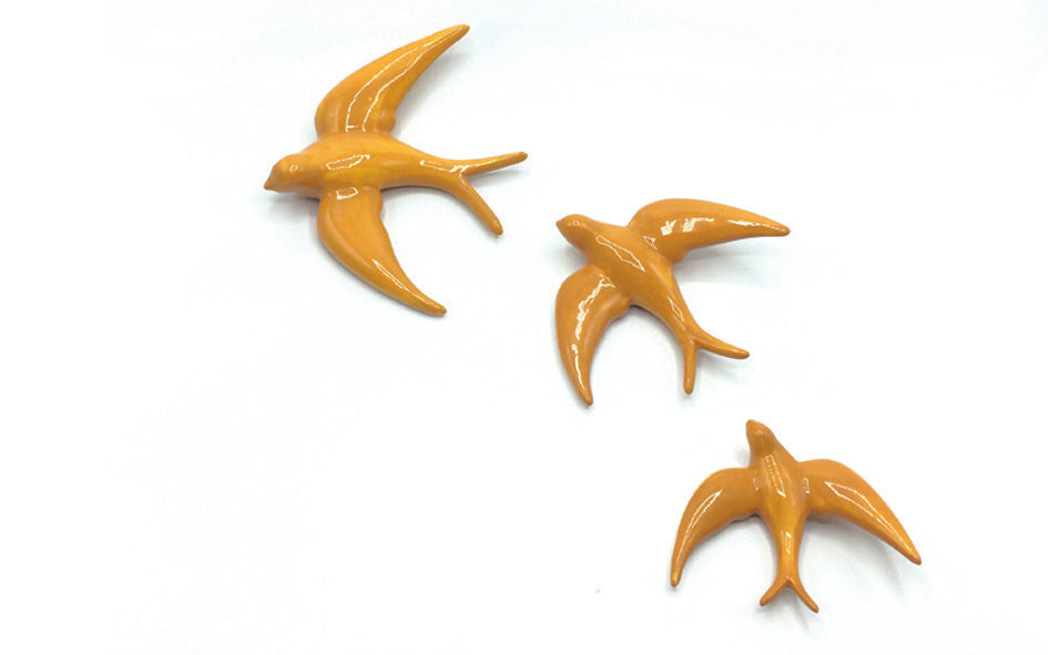 Golondrina mostaza grande