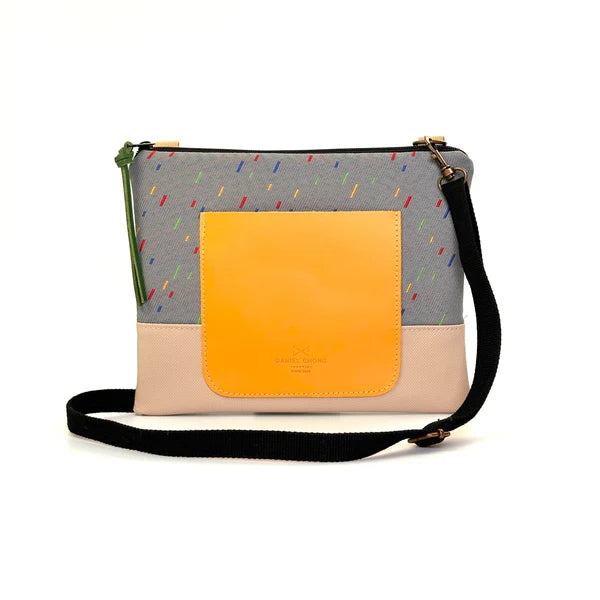 Bandolera mini cuadrada con bolsillo chispis