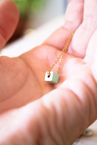 Little CUBE. Minimalist and geometric necklace made of enameled brass. Enameled. Simple and modern necklace.
